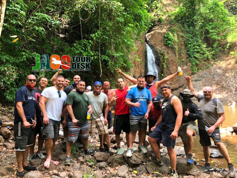 Large group celebrating at Sutton Waterfall after the ride