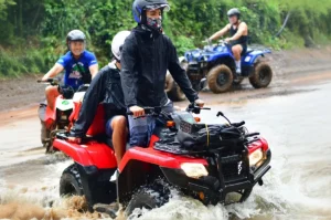 ATV tour group at Tulin river in Jaco Costa Rica