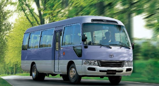 Toyota Coaster with daily driver in Jaco Costa Rica