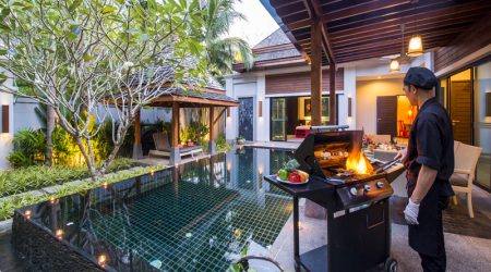A photo of a private chef preparing a meal in a vacation rental at Los Sueños Resort in Costa Rica